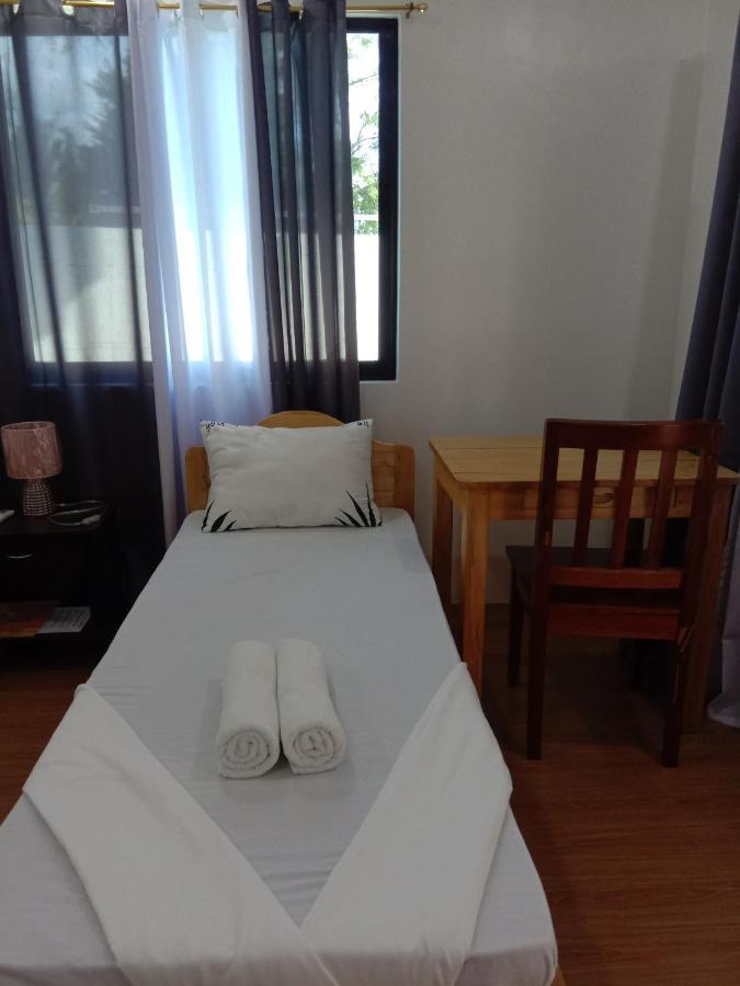 Rna Guesthouse Moalboal Bagian luar foto