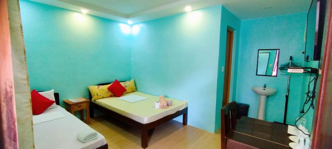 Rna Guesthouse Moalboal Bagian luar foto