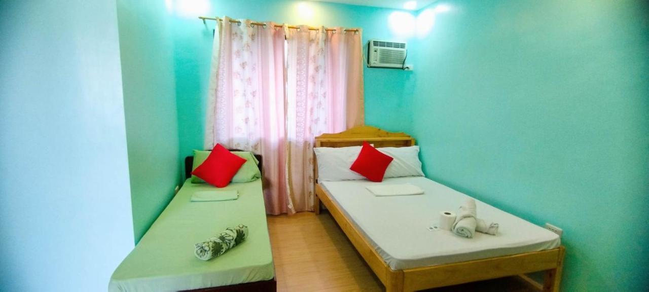 Rna Guesthouse Moalboal Bagian luar foto