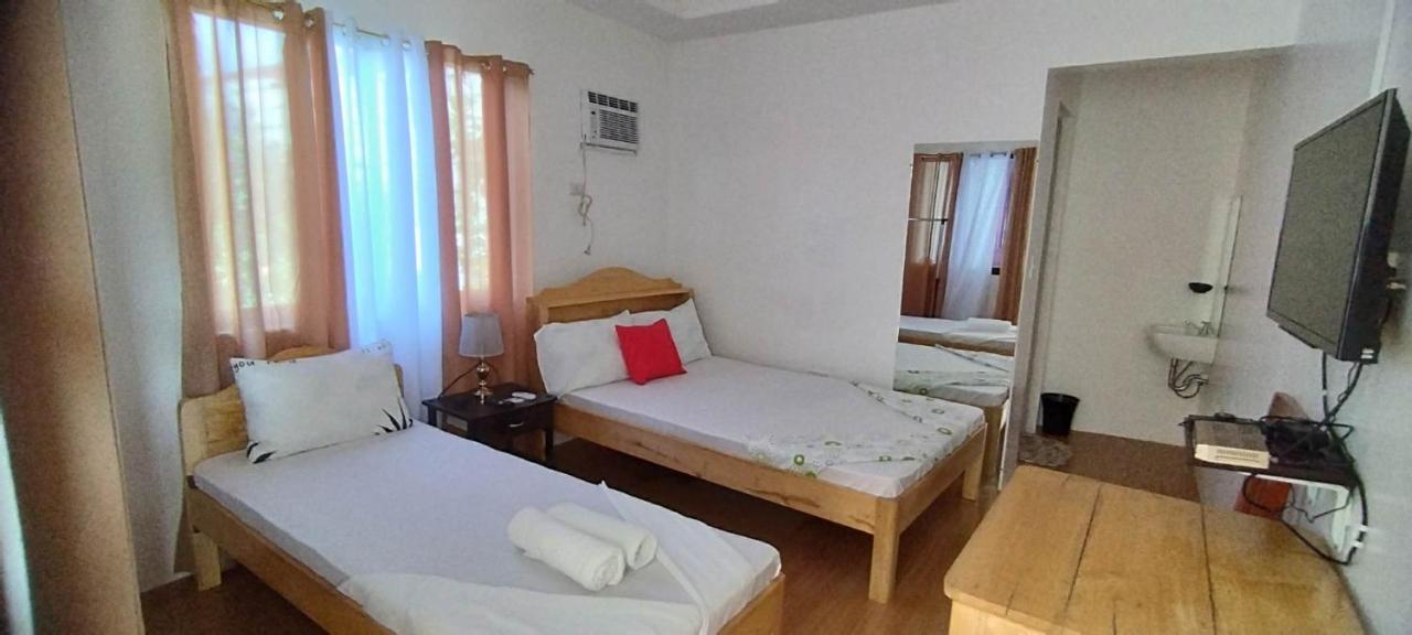 Rna Guesthouse Moalboal Bagian luar foto