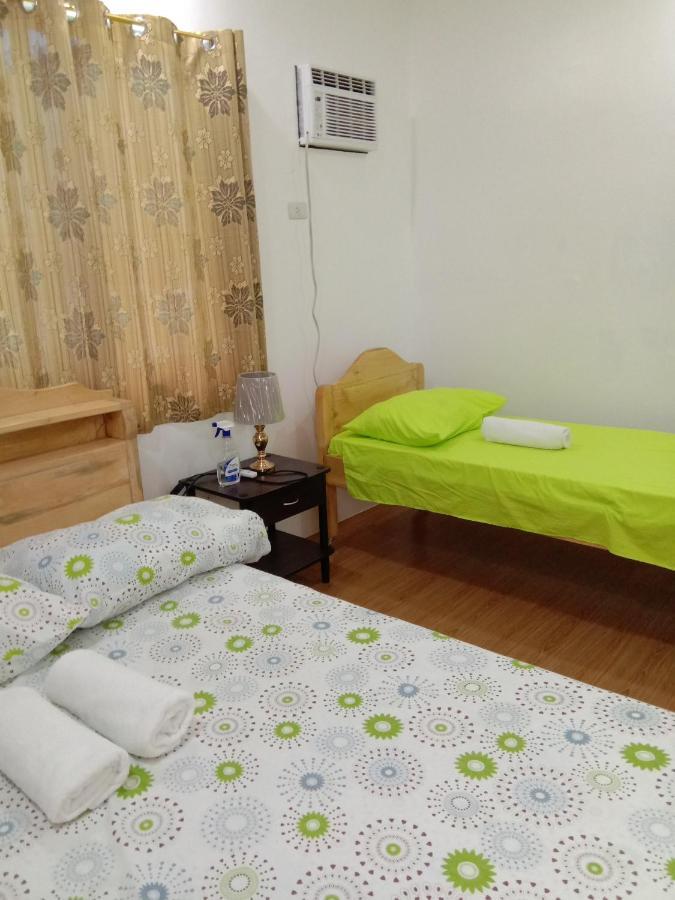 Rna Guesthouse Moalboal Bagian luar foto