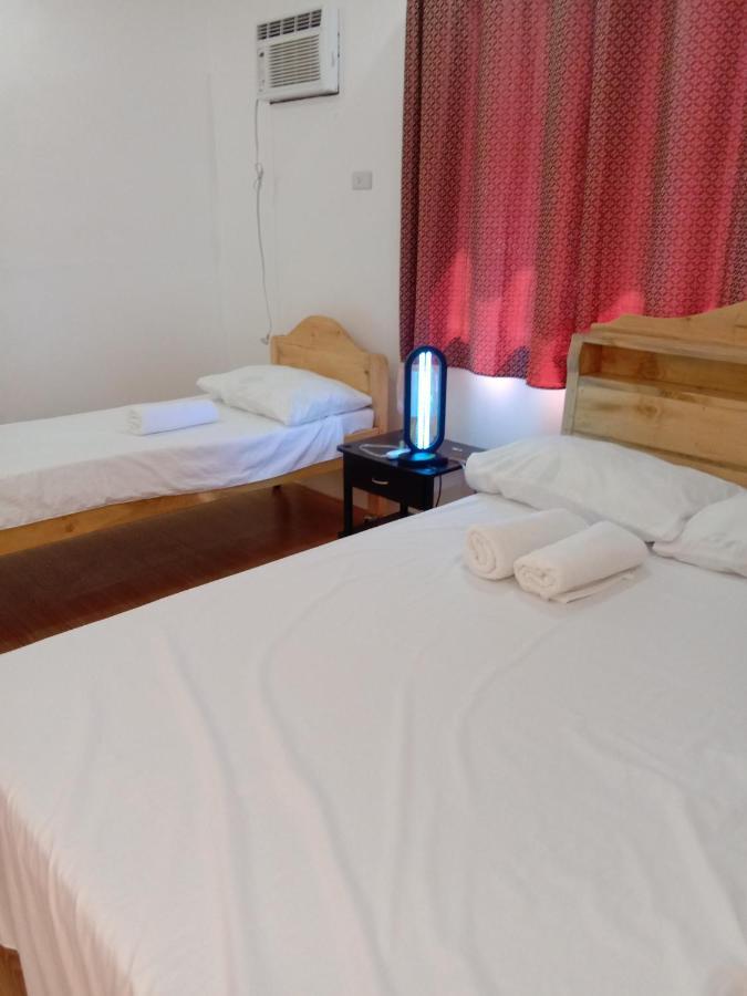 Rna Guesthouse Moalboal Bagian luar foto